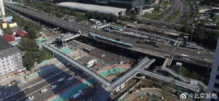 皇冠信用网会员注册网址_北京城区规模最大的“口”字型天桥开通→